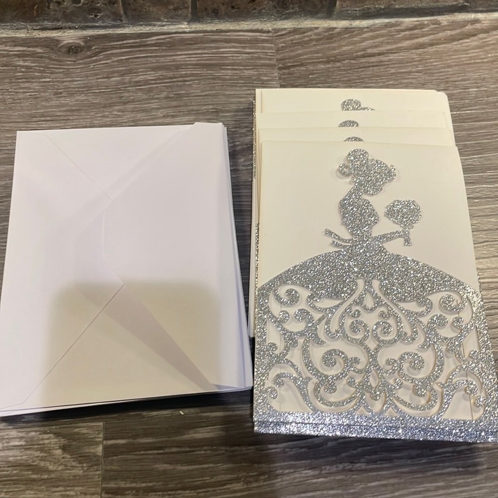Set of 14 laser cut wedding invitation jackets with envelopes